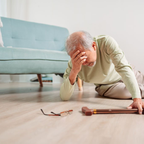 Senior man fallen using fall detection medical alert system for help Senior man fallen using fall detection medical alert system for help
